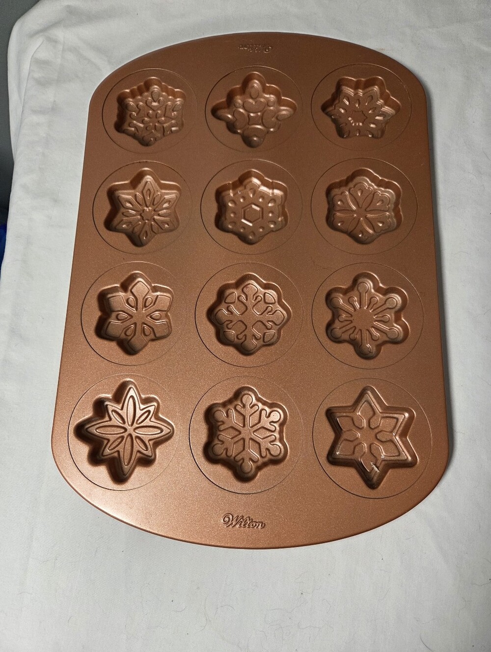 Wilton Copper-Colored 12-Cavity Snowflake Mini Cake Pan